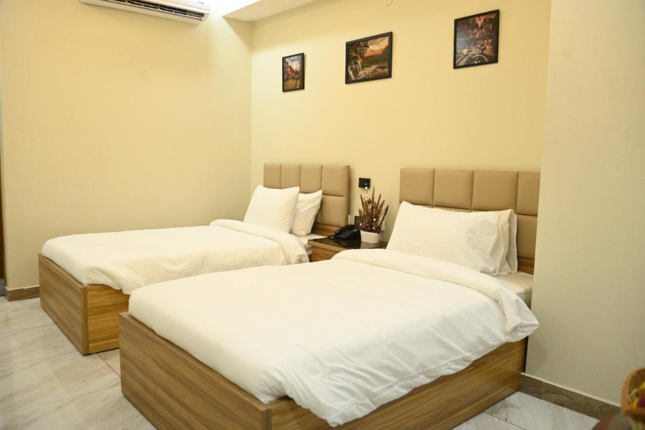 Hotel Pearl Inn Karachi Bagian luar foto