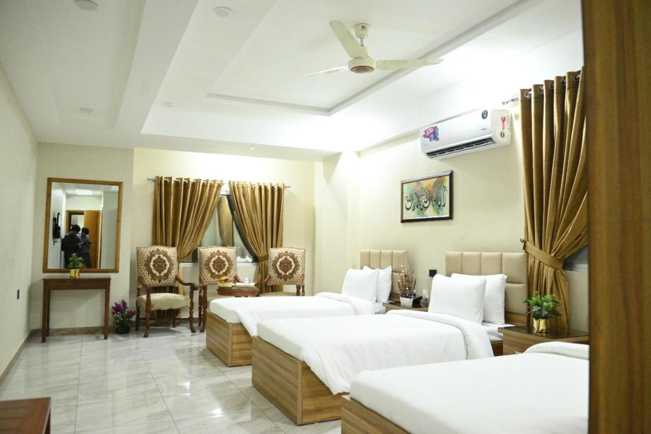 Hotel Pearl Inn Karachi Bagian luar foto