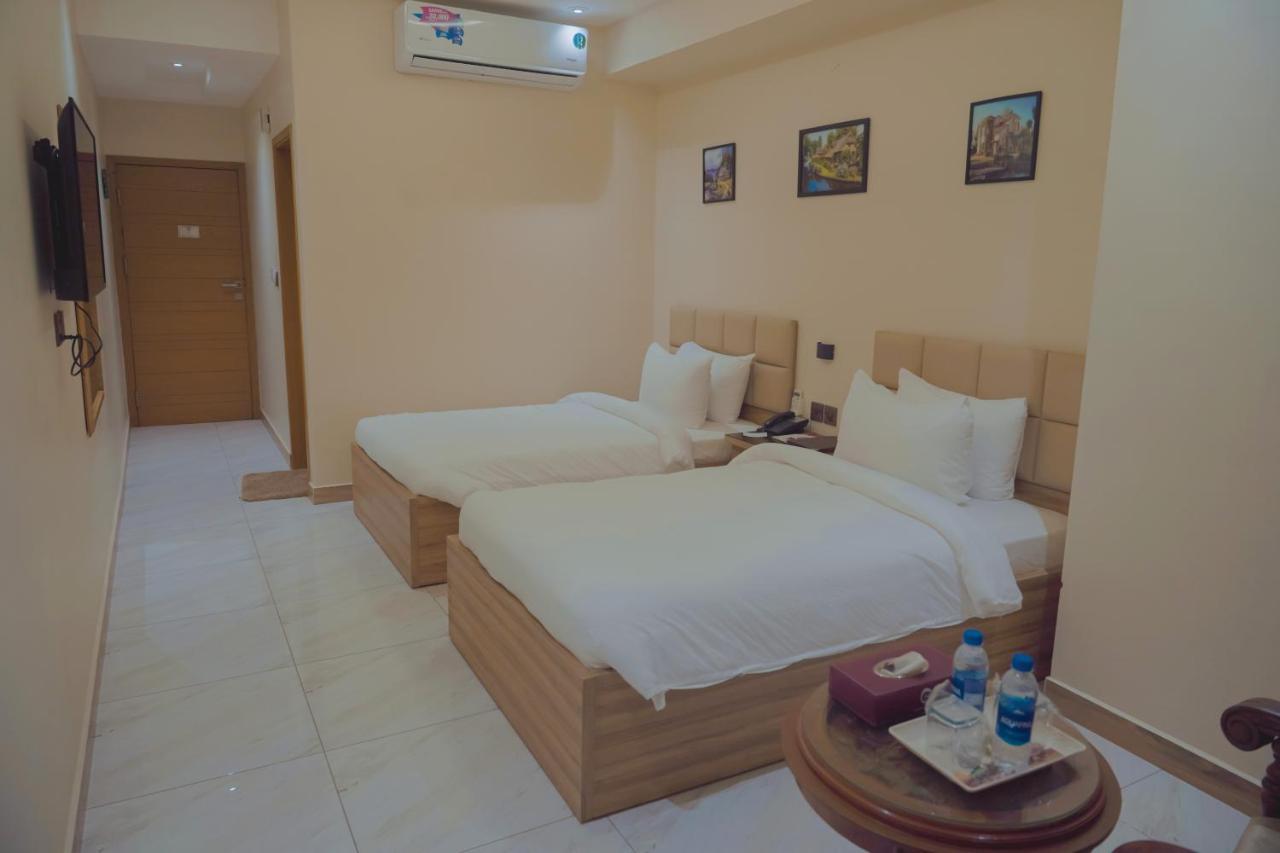 Hotel Pearl Inn Karachi Bagian luar foto